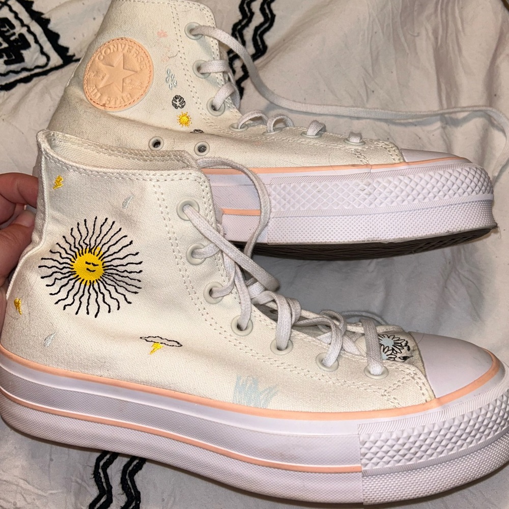 Converse White High-Top Sneakers with Sun Design